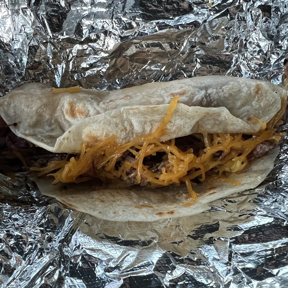 Miller's Smokehouse - Brisket & egg breakfast taco with added cheese was SUPER! - Barbeque Near Me - Belton, Texas