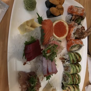 Douzo - Our while sushi platter with Chef's selection sashimi, 2 rolls, and Uni - Sushi Bars Near Me - Boston, Massachusetts