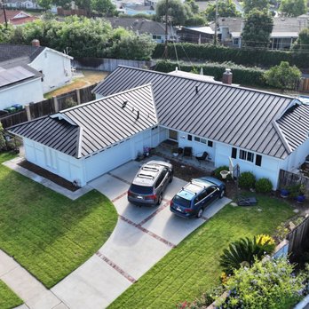 Roof Pro - Roof Pro's newest install of a black standing seam metal roof in Tustin, California. - Roofing Near Me - La Habra, California Roof Pro - Roof Pro's newest install of a black standing seam metal roof in Tustin, California. - Roofing Near Me - La Habra, California