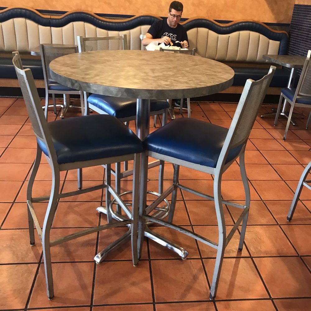 Piñatas Mexican Grill - a boy sitting at a table - Mexican Near Me - Bethpage, New York Piñatas Mexican Grill - a boy sitting at a table - Mexican Near Me - Bethpage, New York