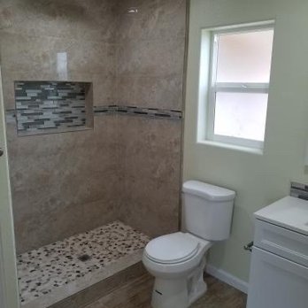 Macias Construction  -  bathroom with a toilet and shower - General Contractors Near Me