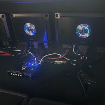 PNA Autosport Corp - 3 JL Audio VXi amplifiers we're discreetly installed behind the rear seats. - Car Stereo Installation Near Me - Ridgewood, New York
