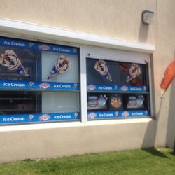 Fishnets Takeaway - The side wall. Displays the goods available in-store