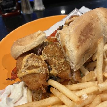 Magnim's - Shrimp Po' boy sandwich and massive fries - Lounges Near Me - El Paso, Texas Magnim's - Shrimp Po' boy sandwich and massive fries - Lounges Near Me - El Paso, Texas