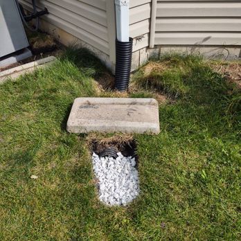 Lindsey the Lawn Lady - This is the second visit where they just put the grate on and then put rocks down.... - Landscaping Near Me - Plano, Illinois
