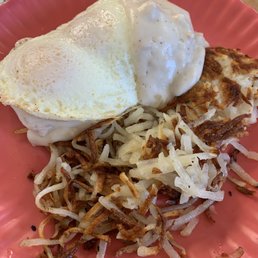 Biscuit and gravy with the perfectly cooked runny egg. Loved the hashbrowns. Biscuit and gravy with the perfectly cooked runny egg. Loved the hashbrowns.