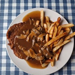 Rosenhof German Restaurant - Jager snitzchel, brown gravy and mushrooms with fries.
