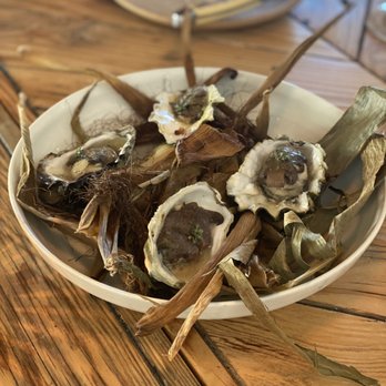 Campfire - Oysters: warm, but not cooked, glazed with rich savory bone marrow and light aromas of charred cornhusks - New American Near Me - Carlsbad, California Campfire - Oysters: warm, but not cooked, glazed with rich savory bone marrow and light aromas of charred cornhusks - New American Near Me - Carlsbad, California