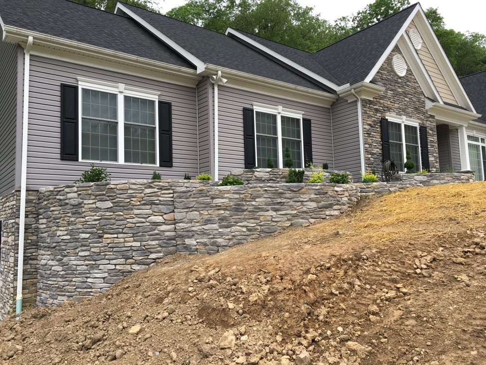 Slide of Rollison Masonry and General Contracting