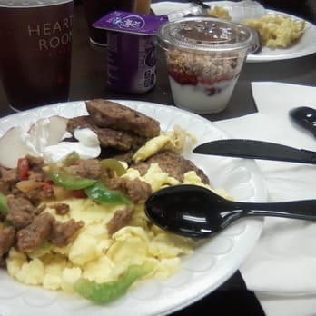 Residence Inn by Marriott - Sausage patties, eggs, potatoes, sausage bits and pepper mix. Yogurt in the background. - Hotels Near Me - San Mateo, California Residence Inn by Marriott - Sausage patties, eggs, potatoes, sausage bits and pepper mix. Yogurt in the background. - Hotels Near Me - San Mateo, California
