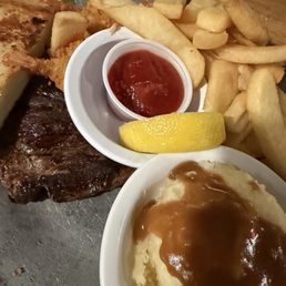 Stake Shrimp Cocktail Sauce Mashed Potatoes with Fries and Toast.