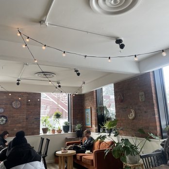 Clementine Coffee - people sitting at tables in a coffee shop - Coffee & Tea Near Me - Fairport, New York Clementine Coffee - people sitting at tables in a coffee shop - Coffee & Tea Near Me - Fairport, New York
