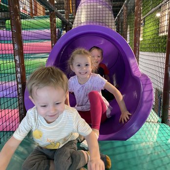 Kidcadia Play Café - Tube slide within play structure. - Cafes Near Me - Dearborn, Michigan Kidcadia Play Café - Tube slide within play structure. - Cafes Near Me - Dearborn, Michigan