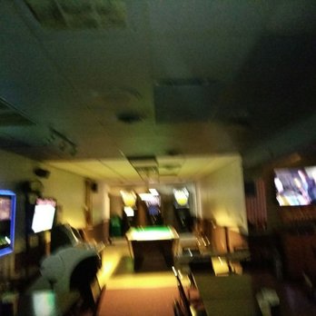 Max Dugans - a man playing pool in a bar - Bars Near Me - Hazel Park, Michigan
