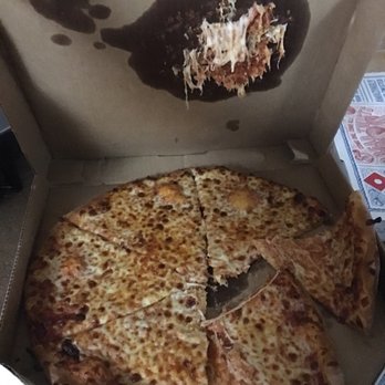 Domino's Pizza - a half eaten pizza in a box - Pizza Near Me - Belleview, Florida