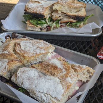 Flat Rock Village Bakery - Italian foreground and turkey cranberry brie behind - Cafes Near Me - Flat Rock, North Carolina