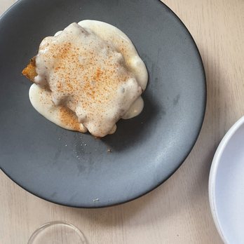 Dario - Potatoes crispy and creamy with Comté, caramelized onion, Tabasco - Italian Near Me - Minneapolis, Minnesota
