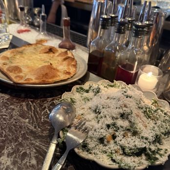 Don Angie - Stuffed Garlic Flatbread and Chrysanthemum Salad - Italian Near Me - New York, New York Don Angie - Stuffed Garlic Flatbread and Chrysanthemum Salad - Italian Near Me - New York, New York