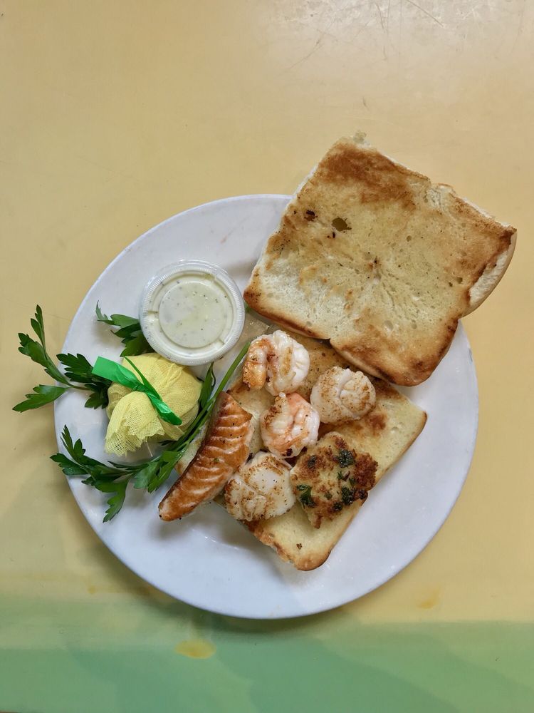 Order Combo Seafood Sliders food online from Phil's Fish Market and Eatery store, Moss Landing on bringmethat.com