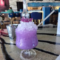 The Ursula - Calpico with vodka, lavender, and ube. Sweet, a little creamy, a little fizzy.