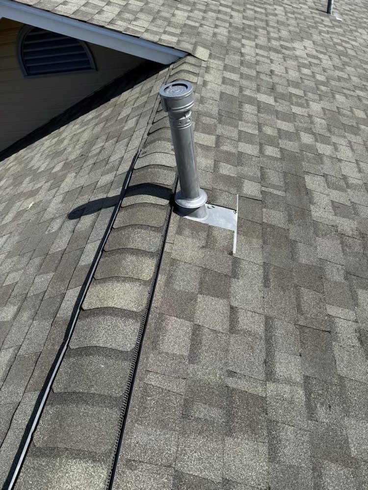 Slide of New Era Roofing