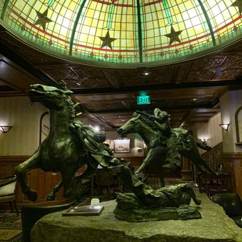 The Driskill - Entrance to bar - Hotels Near Me - Austin, Texas The Driskill - Entrance to bar - Hotels Near Me - Austin, Texas