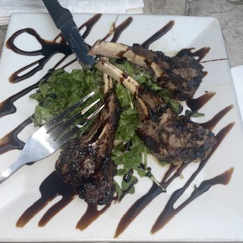 Chestnut Grill and Sidewalk Cafe - Lamp Grilled Petite Lamb Chops with an arugula salad. SO SMALL. Smaller than my fork. - New American Near Me - Philadelphia, Pennsylvania Chestnut Grill and Sidewalk Cafe - Lamp Grilled Petite Lamb Chops with an arugula salad. SO SMALL. Smaller than my fork. - New American Near Me - Philadelphia, Pennsylvania
