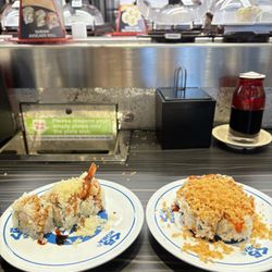 Kura Revolving Sushi Bar - Bar area, golden crunchy roll, crunchy roll. Tayaki ice cream dessert.