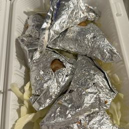 Foil wrapped chicken. Foil wrapped chicken.
