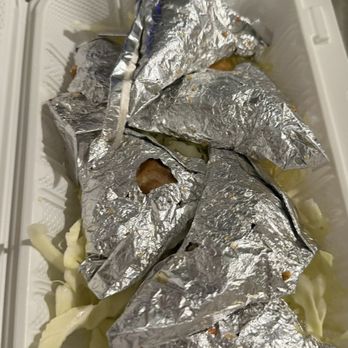 Happy Takeout - Foil wrapped chicken. - Chinese Near Me - Sacramento, California Happy Takeout - Foil wrapped chicken. - Chinese Near Me - Sacramento, California