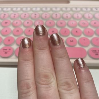 Nail Theory - Basic manicure with shimmering rose gold polish - Waxing Near Me - Houston, Texas Nail Theory - Basic manicure with shimmering rose gold polish - Waxing Near Me - Houston, Texas