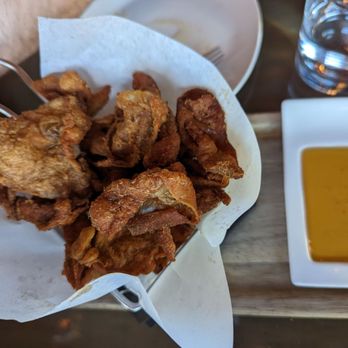 Carson Kitchen - CRISPY CHICKEN SKINS smoked honey - New American Near Me - Las Vegas, Nevada