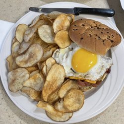 New York Burgers & Grill - Bacon Cheeseburger with sunny side up egg and potato chips