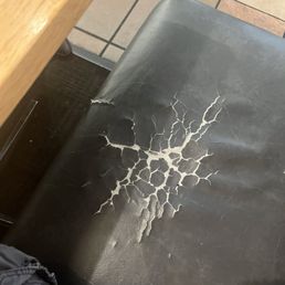 All of the booth seats looked like this. Sad state.