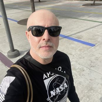 Farmers Market - a man in sunglasses and a black t - shirt - Farmers Market Near Me - Long Beach, California Farmers Market - a man in sunglasses and a black t - shirt - Farmers Market Near Me - Long Beach, California
