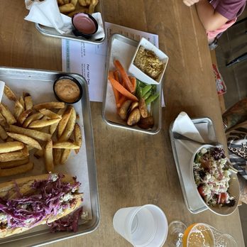 Grain Theory - Peri peri roll, hummus, chicken tenders, salad. - Breweries Near Me - Abilene, Texas Grain Theory - Peri peri roll, hummus, chicken tenders, salad. - Breweries Near Me - Abilene, Texas
