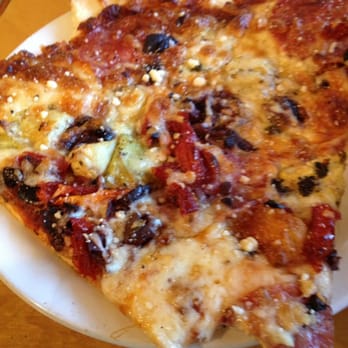 Panini Bakery - Holy cow! Salami,  feta, kalamata, sun dried tomato and artichoke! An - Bakeries Near Me - Newport, Oregon