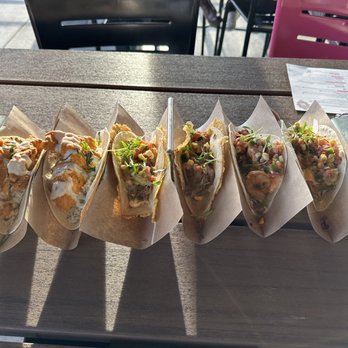 Velvet Taco - Left to right - Chicken #3 Spicy Tikka Chicken #12 Slow-Roasted Angus Brisket #17 Mexi-Cali Shrimp - New American Near Me - Grapevine, Texas
