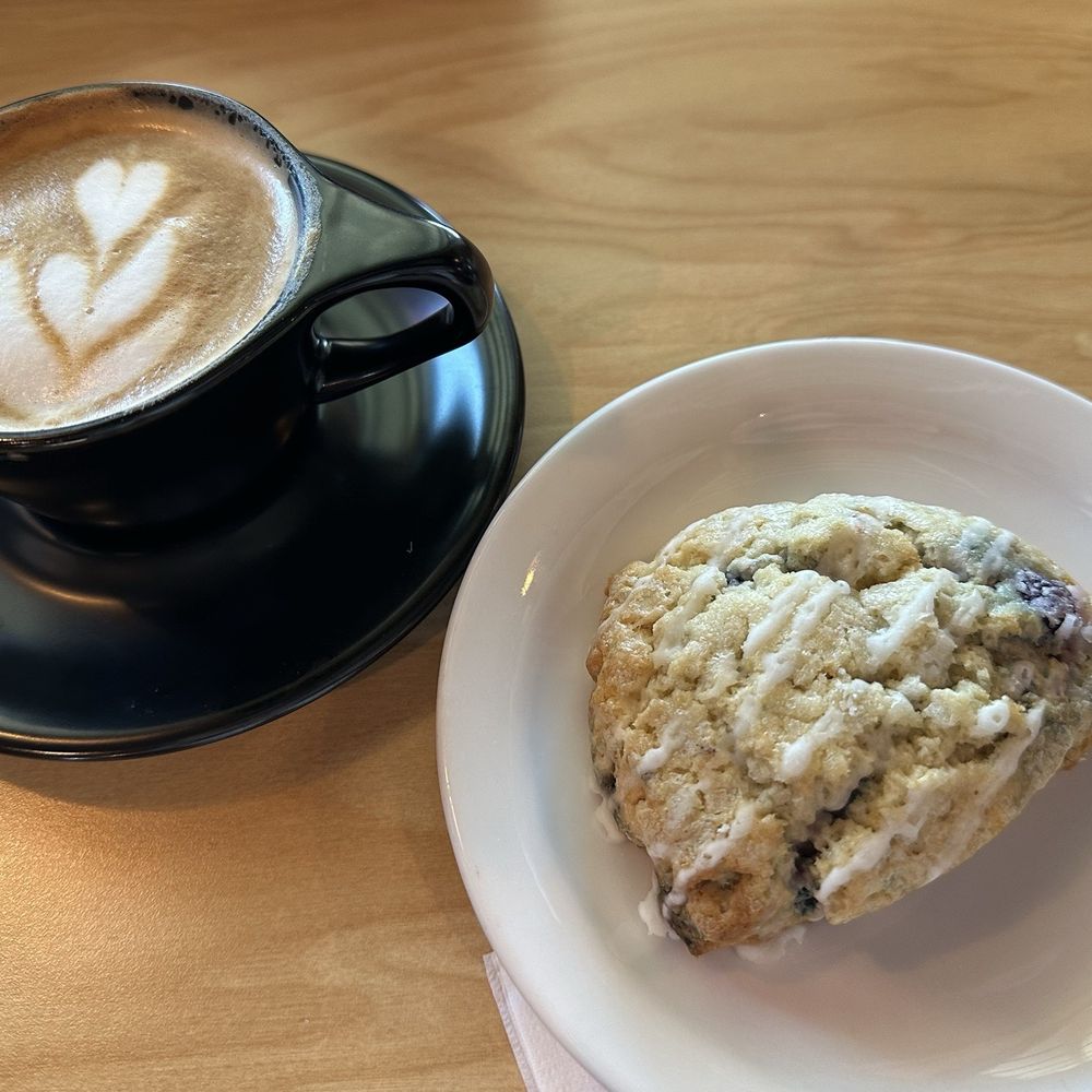 1418 Coffee - Cappuccino and a lemon blueberry scone. - Coffee & Tea Near Me - Celina, Texas 1418 Coffee - Cappuccino and a lemon blueberry scone. - Coffee & Tea Near Me - Celina, Texas