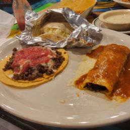 This is the #26. Soft chicken taco, spinach enchilada and carne con queso This is the #26. Soft chicken taco, spinach enchilada and carne con queso