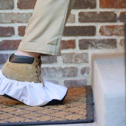 Emerald Organic Pest Control - We always wear boot covers to keep your homes clean.