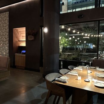 Madre - a dining room with a view of the city - Mediterranean Near Me - Raleigh, North Carolina Madre - a dining room with a view of the city - Mediterranean Near Me - Raleigh, North Carolina