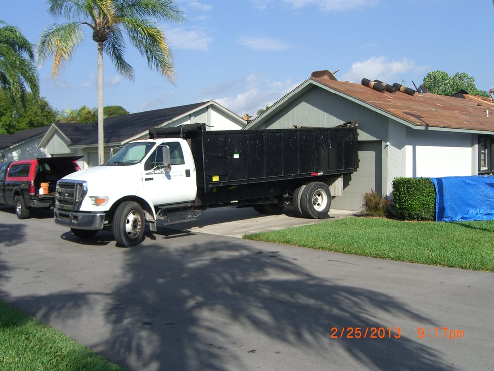 Slide of Heron Bay Roofing