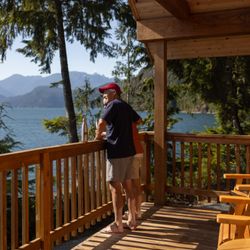 Klahoose Wilderness Resort - Balcony from one of the cedar log cabins