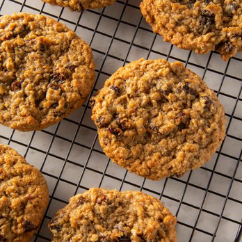 Mariah's Cookies - oatmeal cookies on a cooling rack - Desserts Near Me Mariah's Cookies - oatmeal cookies on a cooling rack - Desserts Near Me