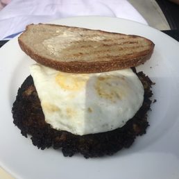 Short rib hash with eggs fried over medium. Short rib hash with eggs fried over medium.