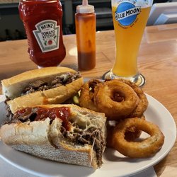 Lombardi's Bar & Grill - Great spot!  A stone's throw from my lake house.  Super friendly staff and look at that cheesesteak!!