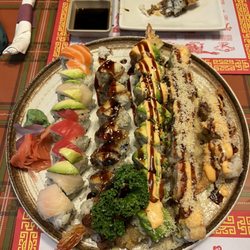 Osaka Steak House - Rainbow roll, black dragon, tempura dragon, monster roll
