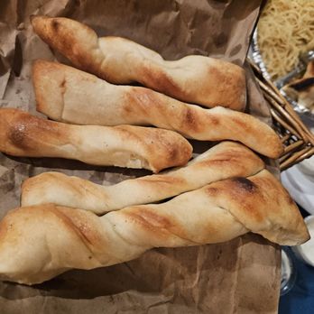 Sauced Pizzeria - Breadsticks sans any dusting - Italian Near Me - San Diego, California Sauced Pizzeria - Breadsticks sans any dusting - Italian Near Me - San Diego, California