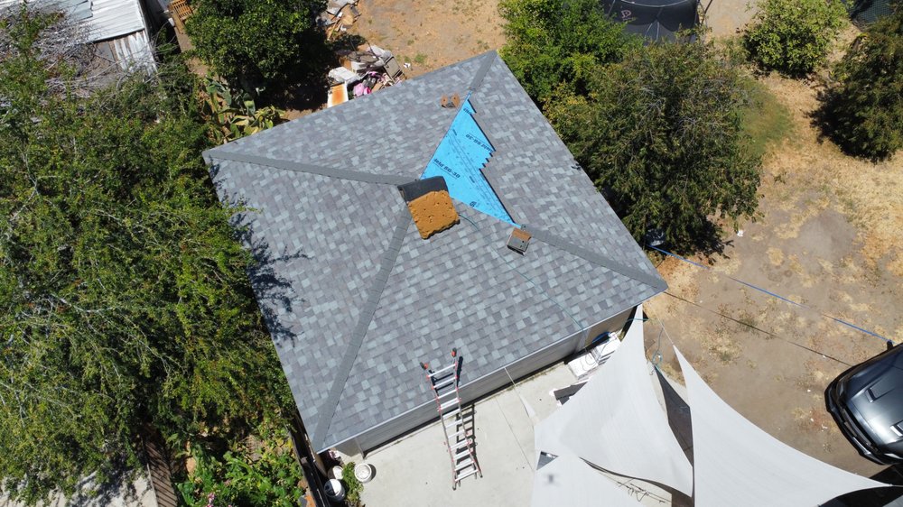 Slide of Ruiz Roofing